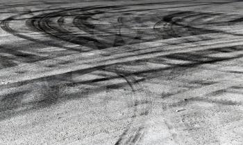 Abstract road background with crossing of tires tracks