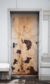 Old rusted locked door background texture