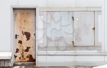 Old rusted locked door and windows background texture