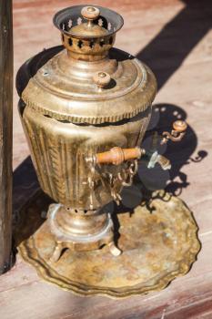 Traditional Russian Samovar, a metal container used to heat and boil water for tea