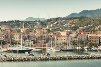Propriano port, Seaside view, South Corsica, France. Vintage tonal correction filter, old style 
filter effect