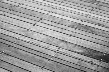 Gray floor made of wooden boards, background photo with selective focus