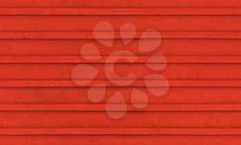 Old red wooden wall. Seamless background photo texture