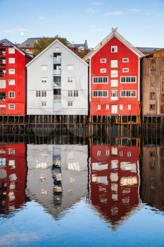 Colorful wooden houses in old town of Trondheim, Norway. Coast of Nidelva river