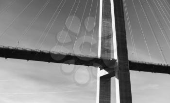 Black and white photo of modern automotive cable-stayed bridge in Norway