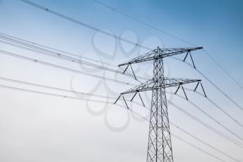 Transmission power tower, electricity pylon. Steel lattice tower, used to support an overhead power line
