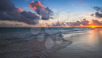 Tropical sunrise. Atlantic Ocean coast, Bavaro beach, Hispaniola Island. Dominican Republic, coastal landscape