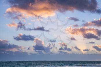 Horizon over Atlantic ocean. Landscape with dramatic cloudy sky in sunrise, Dominican republic. Punta Cana. Bavaro beach