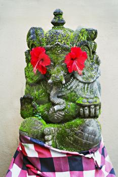 BALI, INDONESIA - FEBRUARY 17: Ornate monster statue at Ulun Danu temple on February, 17, 2011, Bali, Indonesia