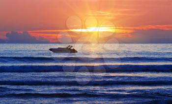 Boat at the sea sunrise