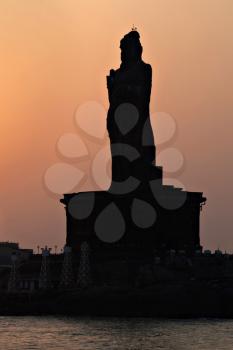 Silhouette of Thiruvalluvar Statue at sunrise, India