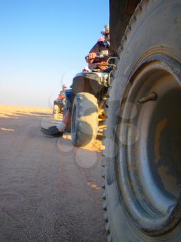 Four wheel motorbike rally in desert