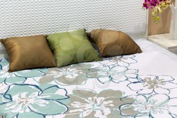 Modern bed with pillows closeup