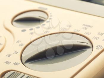 Beige control panel of radio with buttons, closeup picture