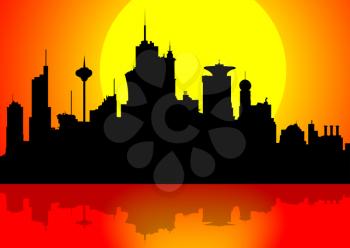 Silhouette of a downtown cityscape at sunset