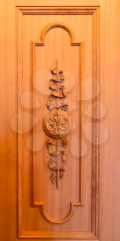 Pattern of flowers carved on wooden background