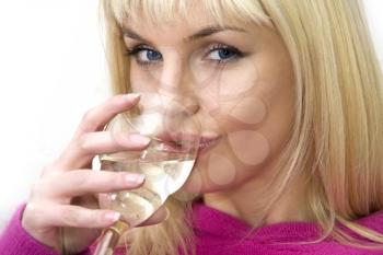 Attractive woman drinking the wine