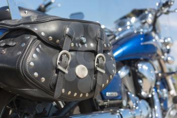 Motorcycle with a leather saddle bag