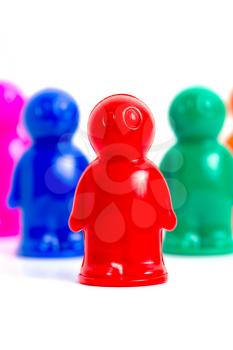 Colorful toy people group vertical image