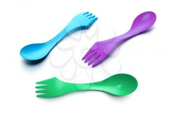 Three plastic spoon-forks isolated on white