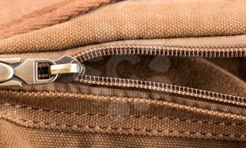 Macro of bag with open zipper