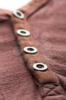 Brown jacket background with buttons