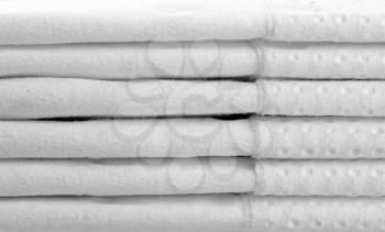 Heap of white paper napkins. Close-up view