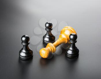 Several chess figures on the table 