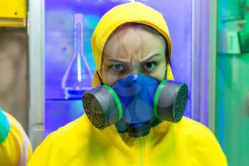 Woman wearing protective outerwear suit close up