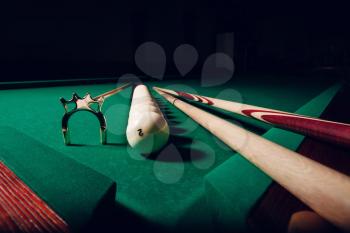 Billiard equipment on the table, balls in the line