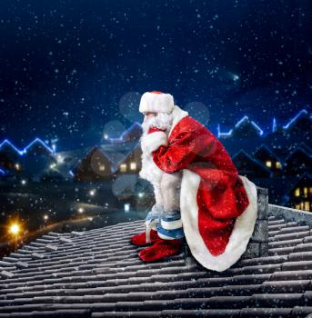 Bearded Santa Claus in red costume sitting on rooftop and shit in the chimney. Humor decoration. Funny surprise