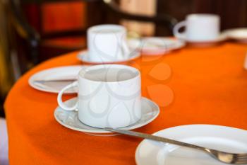 Ceylon tea is a traditional beverage on Sri Lanka. White cups on the table