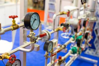 Pressure gauge, valves on water pipeline, heat circuit. Thermal and pressure control station, measurement instrumentation