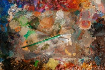 Color palette and brush closeup, nobody, paintbrush art drawing. Artist or painter tools and equipment, painting supplies