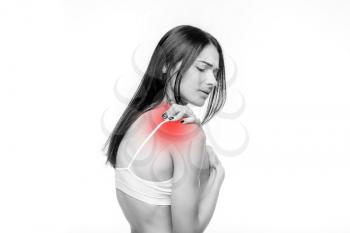 Joint pain, woman have problem with shoulder, white background. Female person in white lingerie, medical advertising or concept