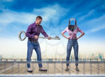 Man holds large key and woman with keyhole instead of a head, cityscape on background. Couple relationship concept