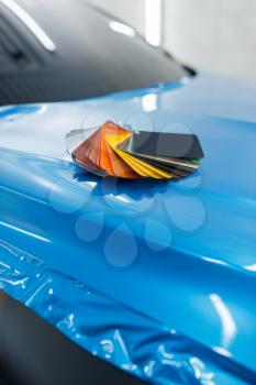 Car wrapping, protective vinyl foil or film color palette on the vehicle, nobody. Auto detailing. Automobile paint protection, professional tuning