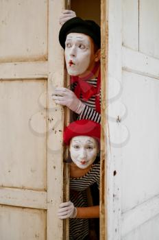 Male and female mime artists, parody comedy. Pantomime theater, comedian, positive emotion, humour performance, funny face mimic and grimace