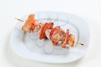 Grilled pork and bacon on skewer  