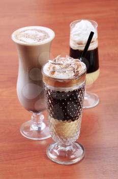 Coffee and chocolate drinks in tall glasses