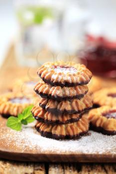Chocolate dipped cookies with jelly center