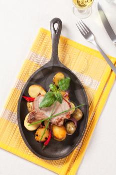 Roasted pork chop and potatoes - overhead