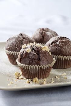 Delicious double chocolate muffins on a plate
