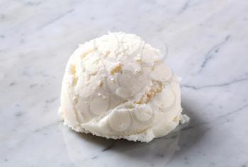 One scoop of white ice cream 