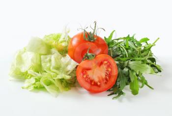Ice lettuce, arugula leaves and tomatoes