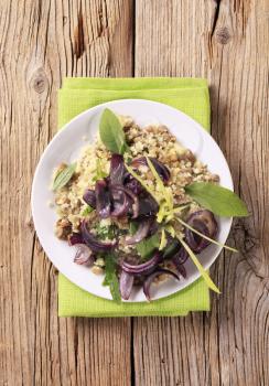 Couscous with lentils, Spanish onion and sage