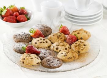 Chocolate chip cookies and fresh strawberries
