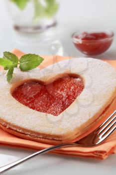 Heart shaped Linzer biscuit with jam filling