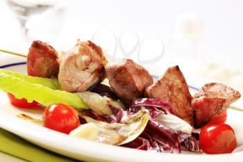 Pork shish kebab and vegetable accompaniment