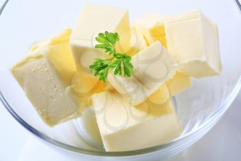 Blocks of fresh butter in a bowl 